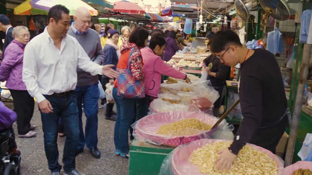 Host Rudy Maxa and guest co-host, restaurateur and chef Daisuke Utagawa visit the Mong Kok Wet Market in Kowloon.