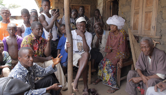 Villagers gather together in Sierra Leone.