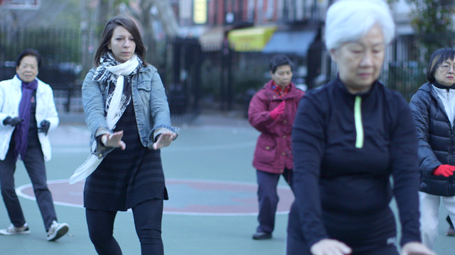 Mickela learning tai chi in Columbus Park in Manhattan's Chinatown.
