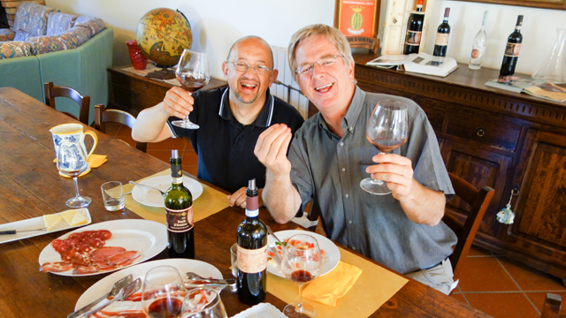 Rick enjoys a meal with guide Roberto Bechi.