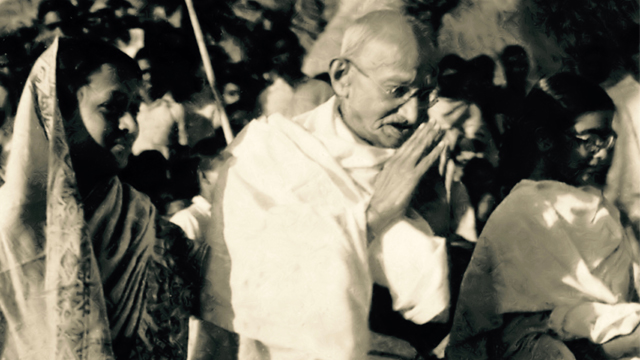 Gandhi greets villagers on his grass-roots peace pilgrimage called “The Miracle of Noakhali” IN East Bengal (1946-47).