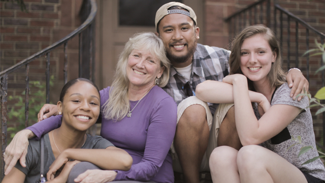 The roadtrippers get in close for a photo with four-time Pulitzer Prize-winning photographer Carol Guzy in Washington, D.C.