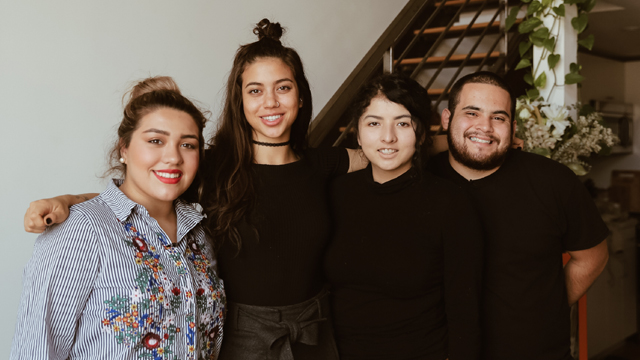 The roadtrippers pose alongside Hustle software engineer Isis Anchalee in San Francisco, California.